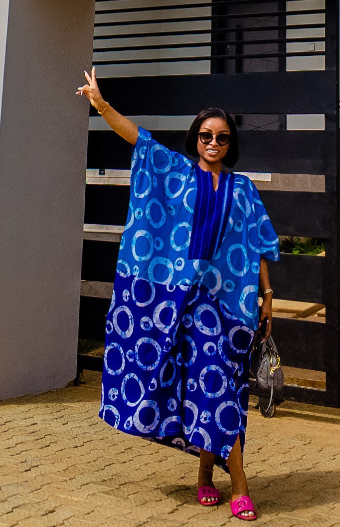 Eden Luxe Founder and CEO posing infront of their newest property in Yaoundé, Cameroon
